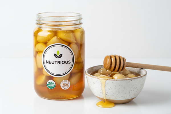 Garlic Honey fermented in a glass jar with lid, netrious glass jar with logo, fda, organic add a small bowl with honey garlic